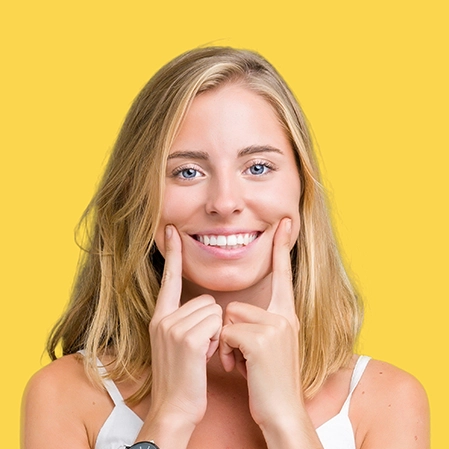 Lady Smiling On Yellow Background